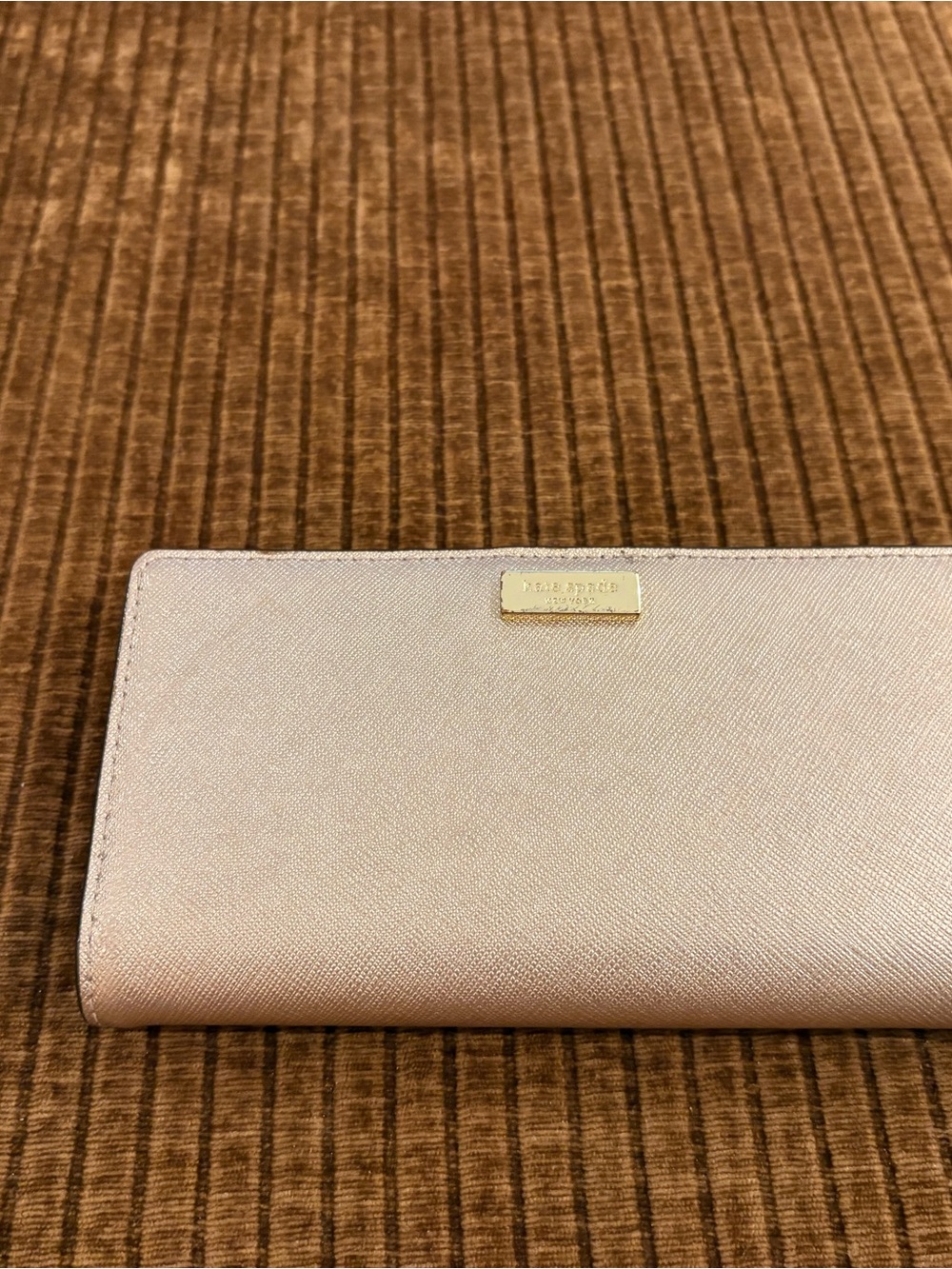 kate spade metallic rose gold long wallet with gold logo